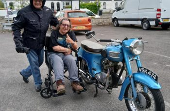 John brings his Triumph motorbike to visit Pat