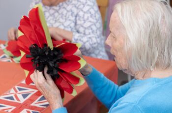 Making poppies VJ Day at Friary Care