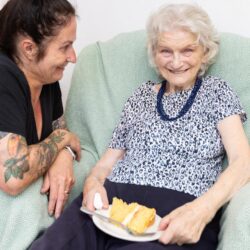 Enjoying cake at our Macmillan Coffee Morning