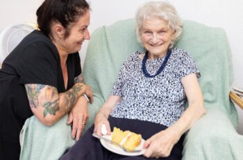 Enjoying cake at our Macmillan Coffee Morning