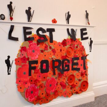 friary care lest we forget poppy decorations