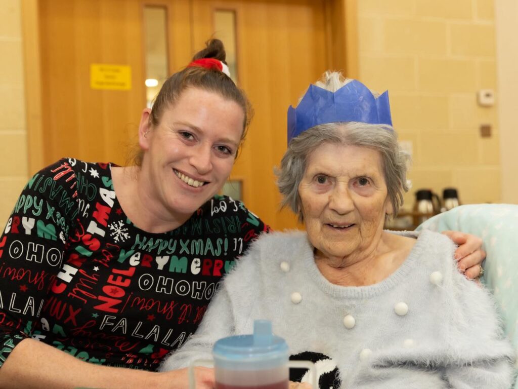 resident enjoying christmas party at friary care
