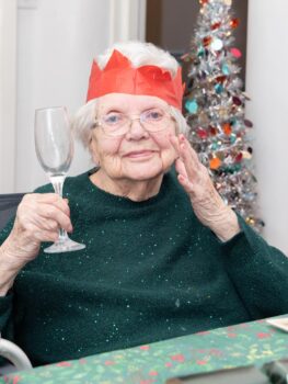 friary care resident enjoying christmas dinner
