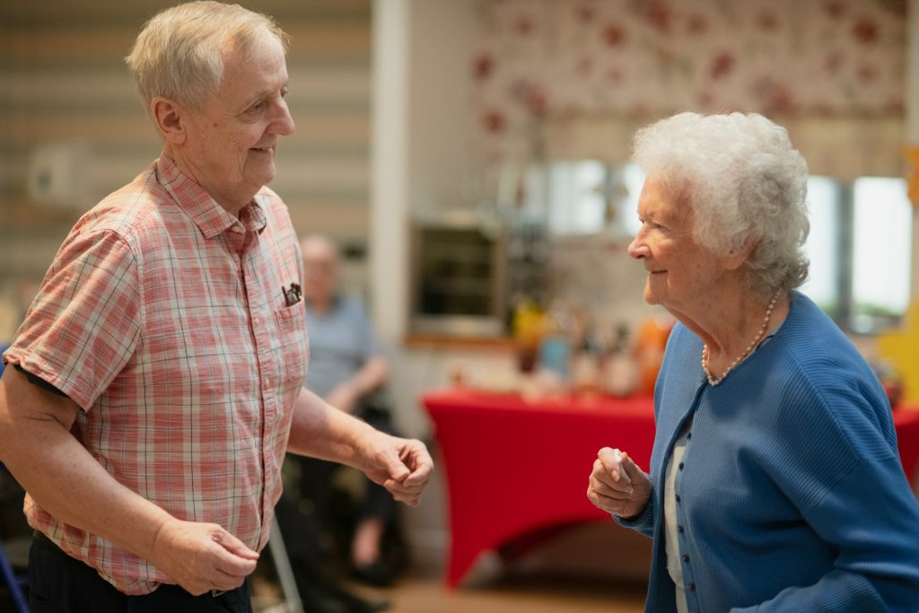 elderly couple dancing