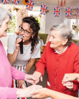 singing to remember d day at friary care