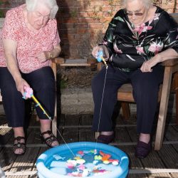 friary care residents playing fishing game